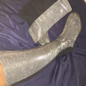 Above the knees glitter boots